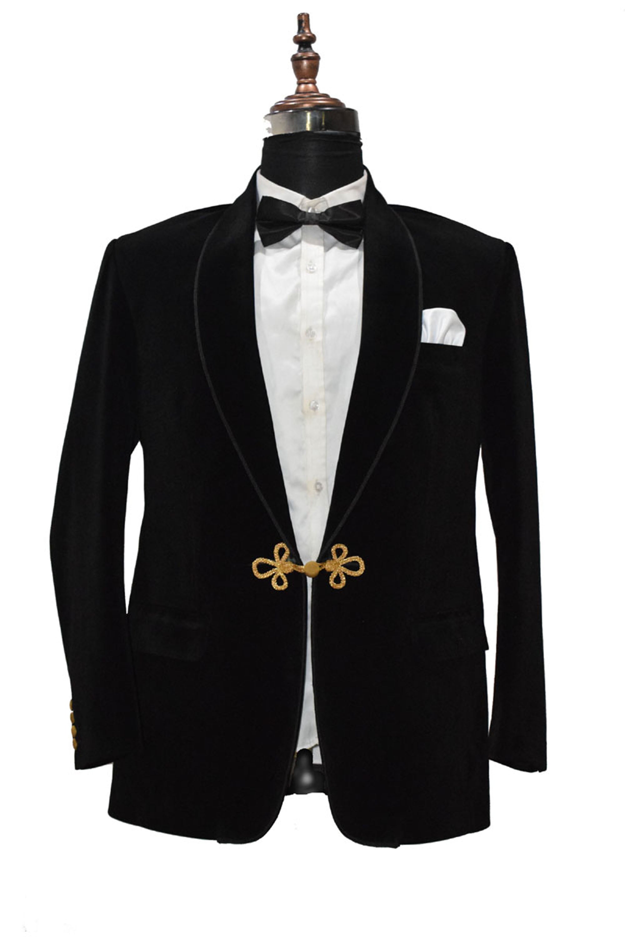 Black velvet smoking jacket with frog closure and shawl collar.