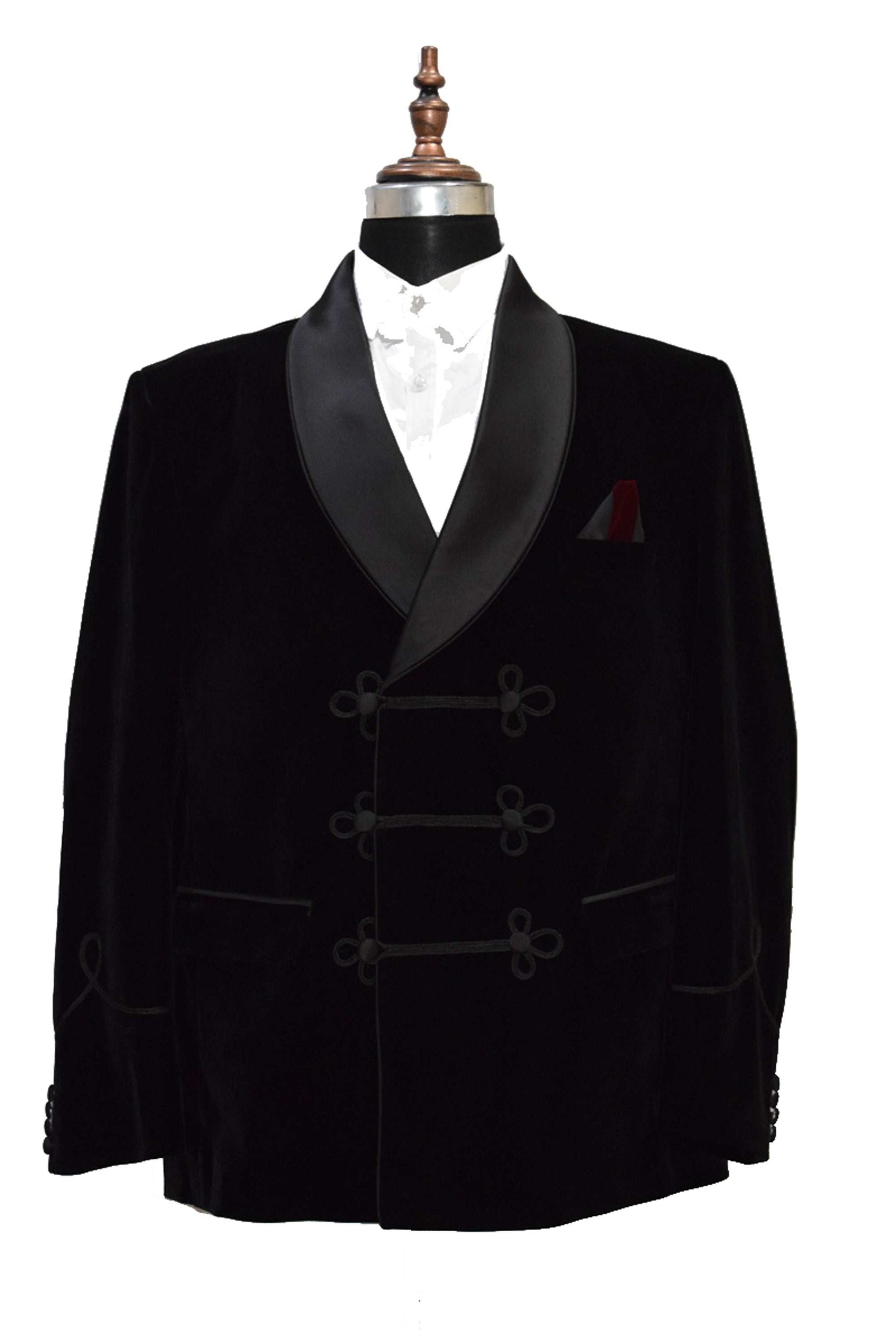 Black velvet smoking jacket with elegant frog closure and shawl collar.