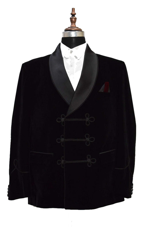 Black velvet smoking jacket with elegant frog closure and shawl collar.