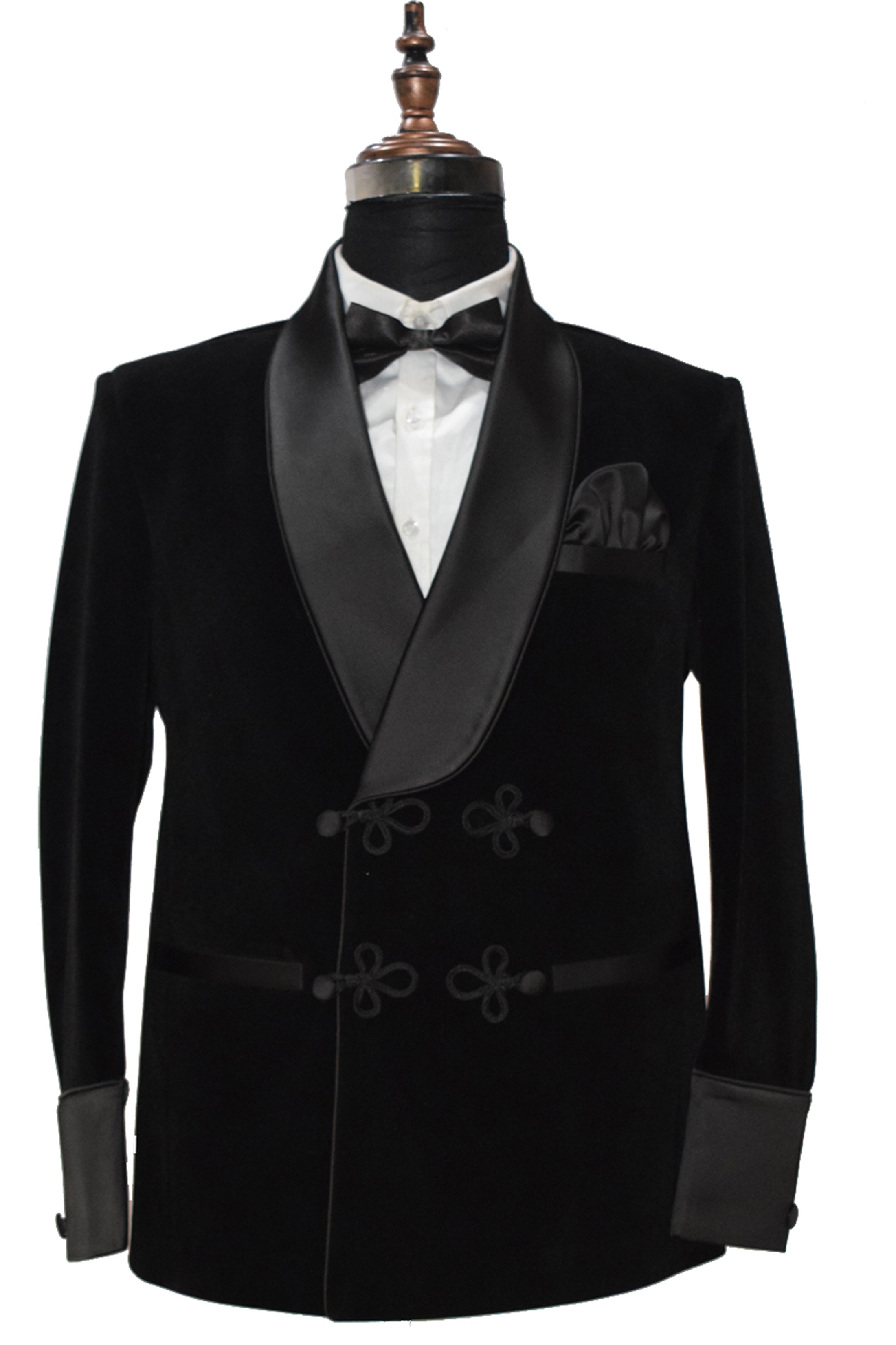 Men's black velvet smoking jacket with frog closure and shawl collar.