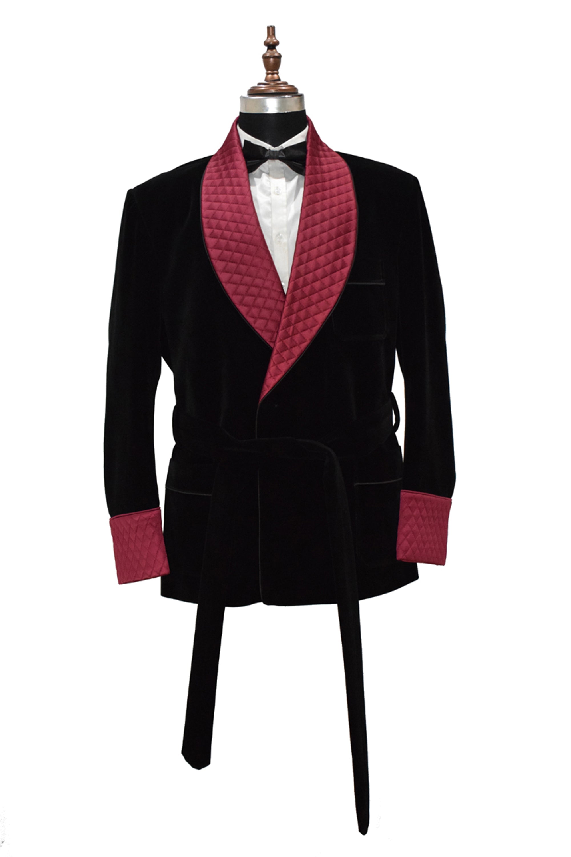 Men's black smoking jacket with quilted lapels and cuffs, featuring a belt for adjustable comfort.