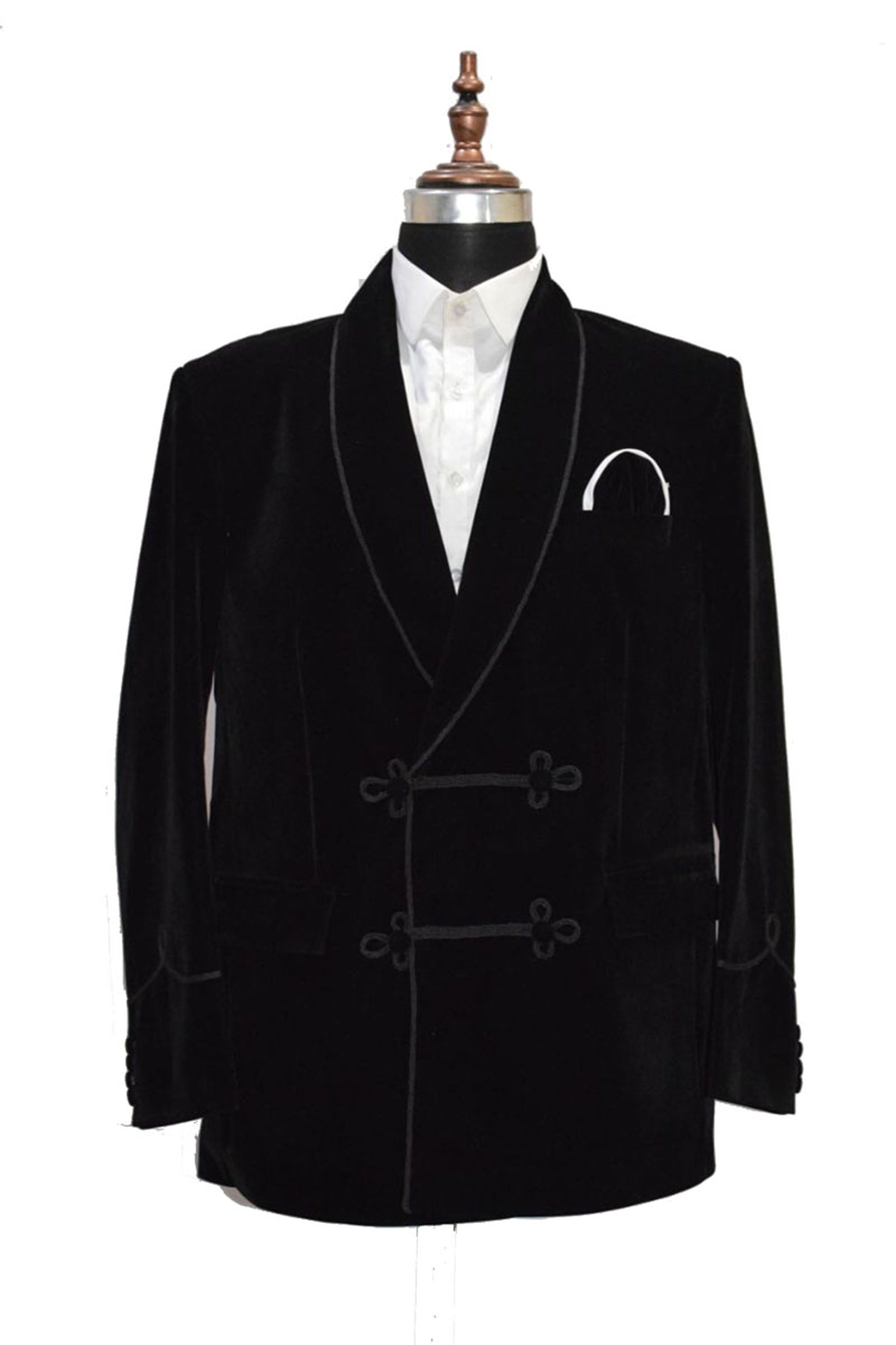 Men's black velvet smoking jacket with frog closure and shawl collar.