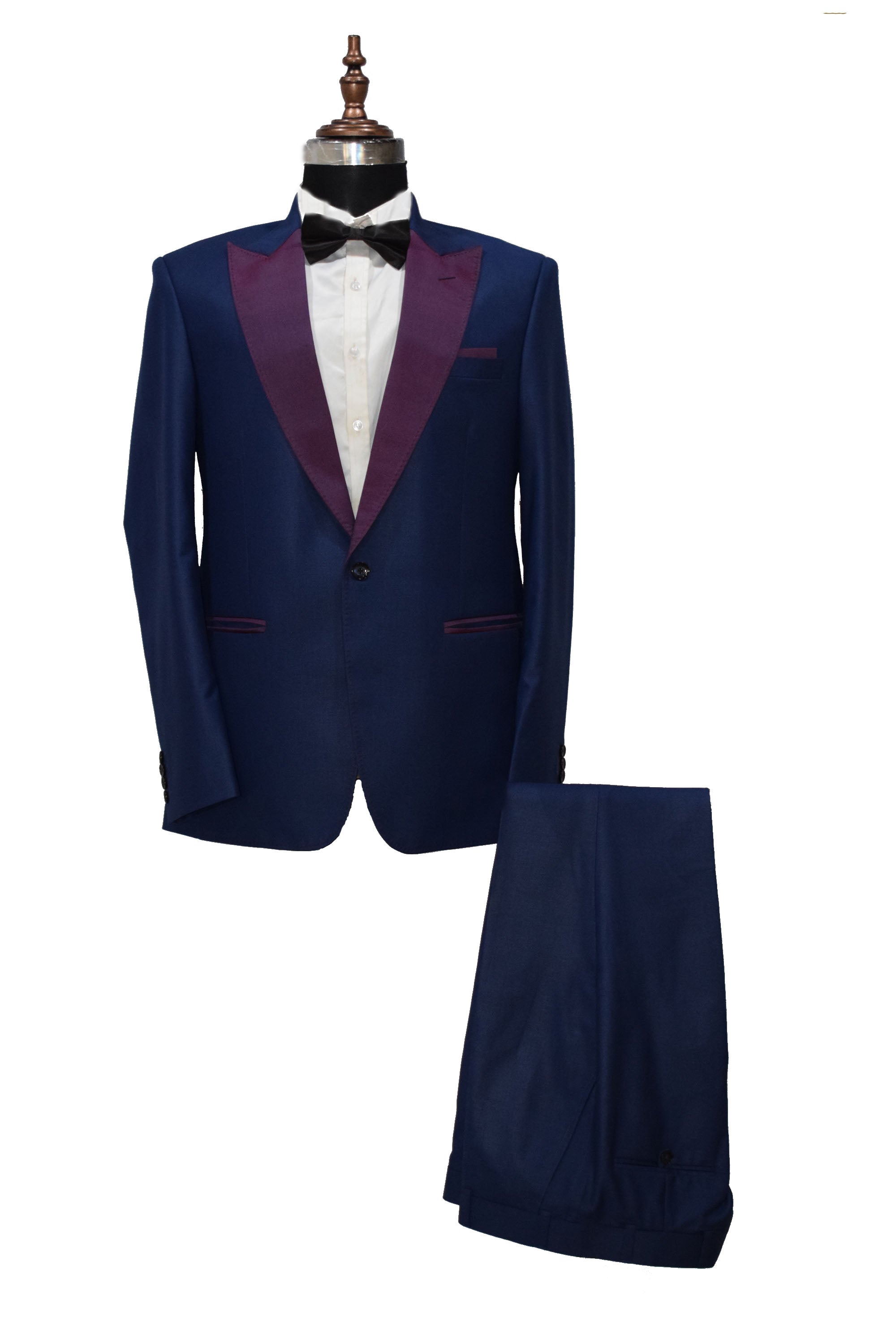Men's blue single-breasted party wear tuxedo suit with jacket and trousers.